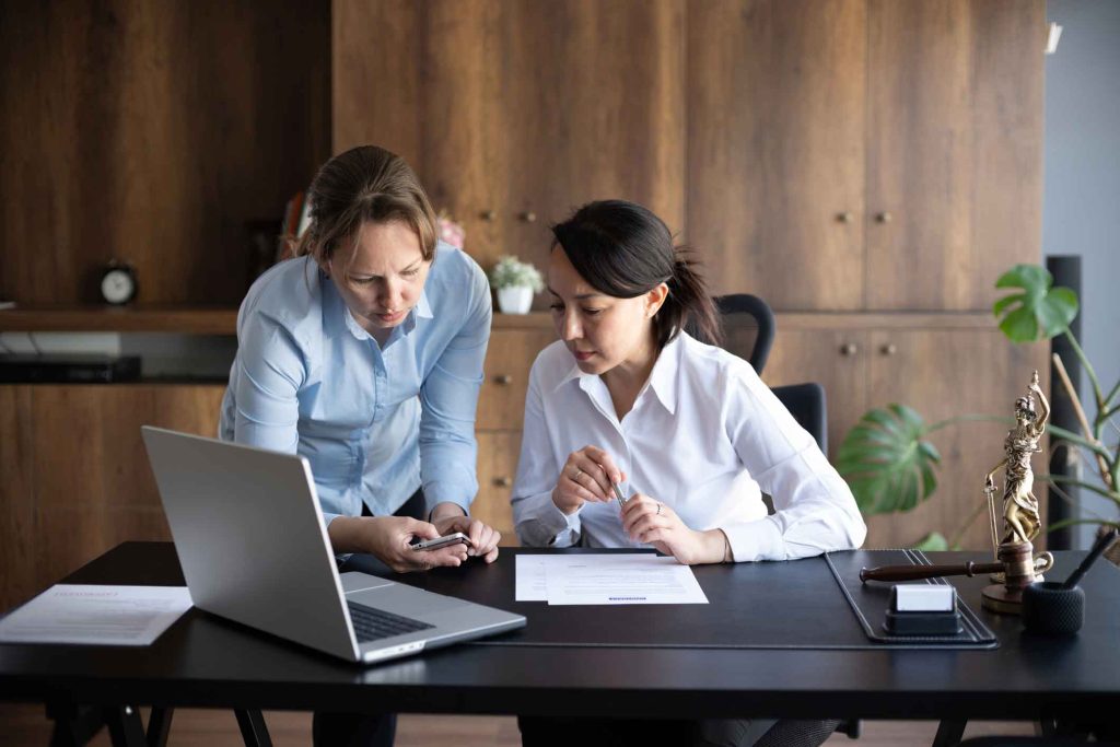 Female advisor lawyer her client with her governance issues in the office
